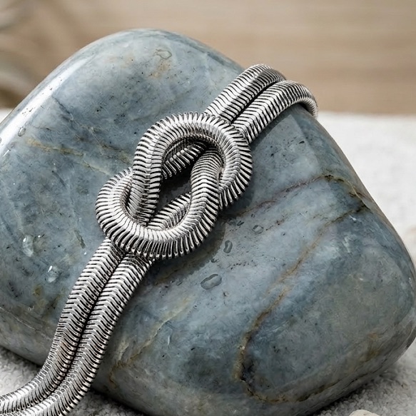 Silver Tone Snake Chain Knot Bracelet 20$